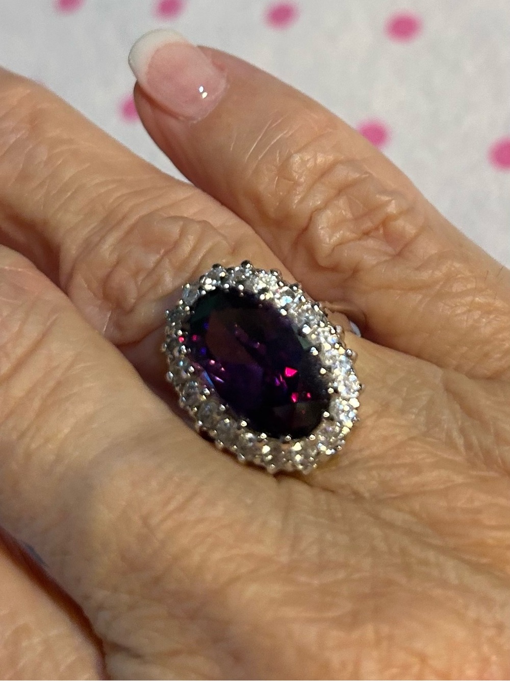 Silver Halo Ring with Deep Purple Oval Stone